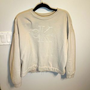 Distressed Calvin Klein Jeans fleece sweatshirt.
